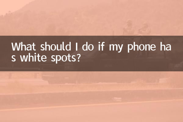 What should I do if my phone has white spots?